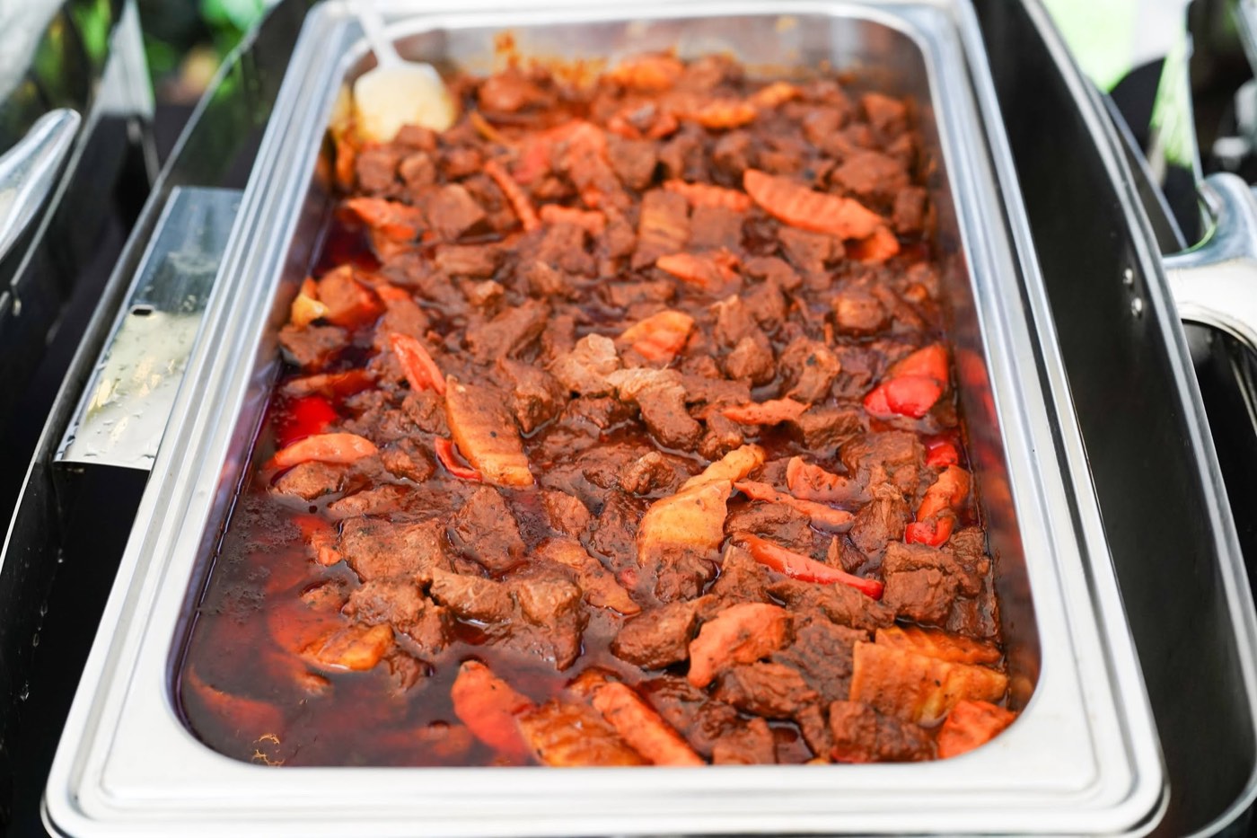 Beef Kaldereta in a real DLT Catering Services chafing tray